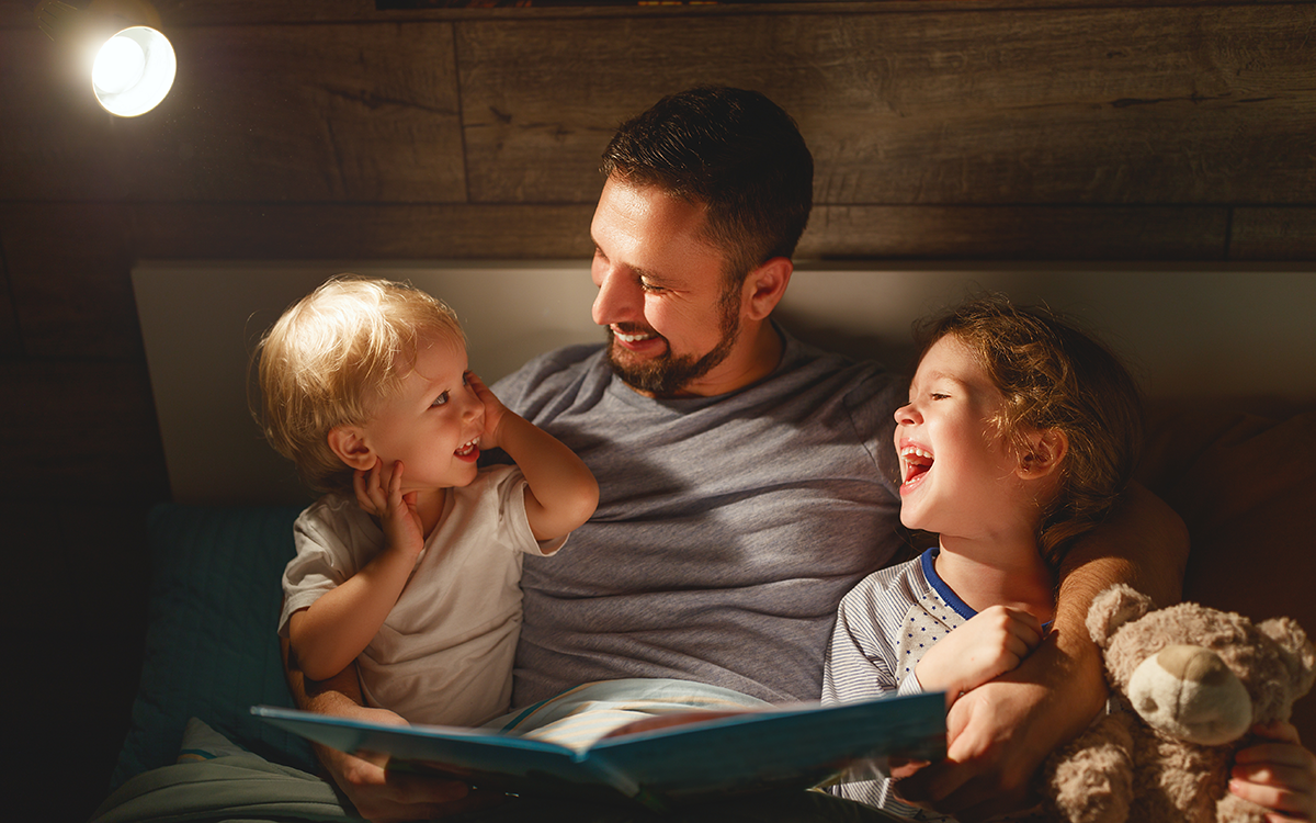Parent reading to kids